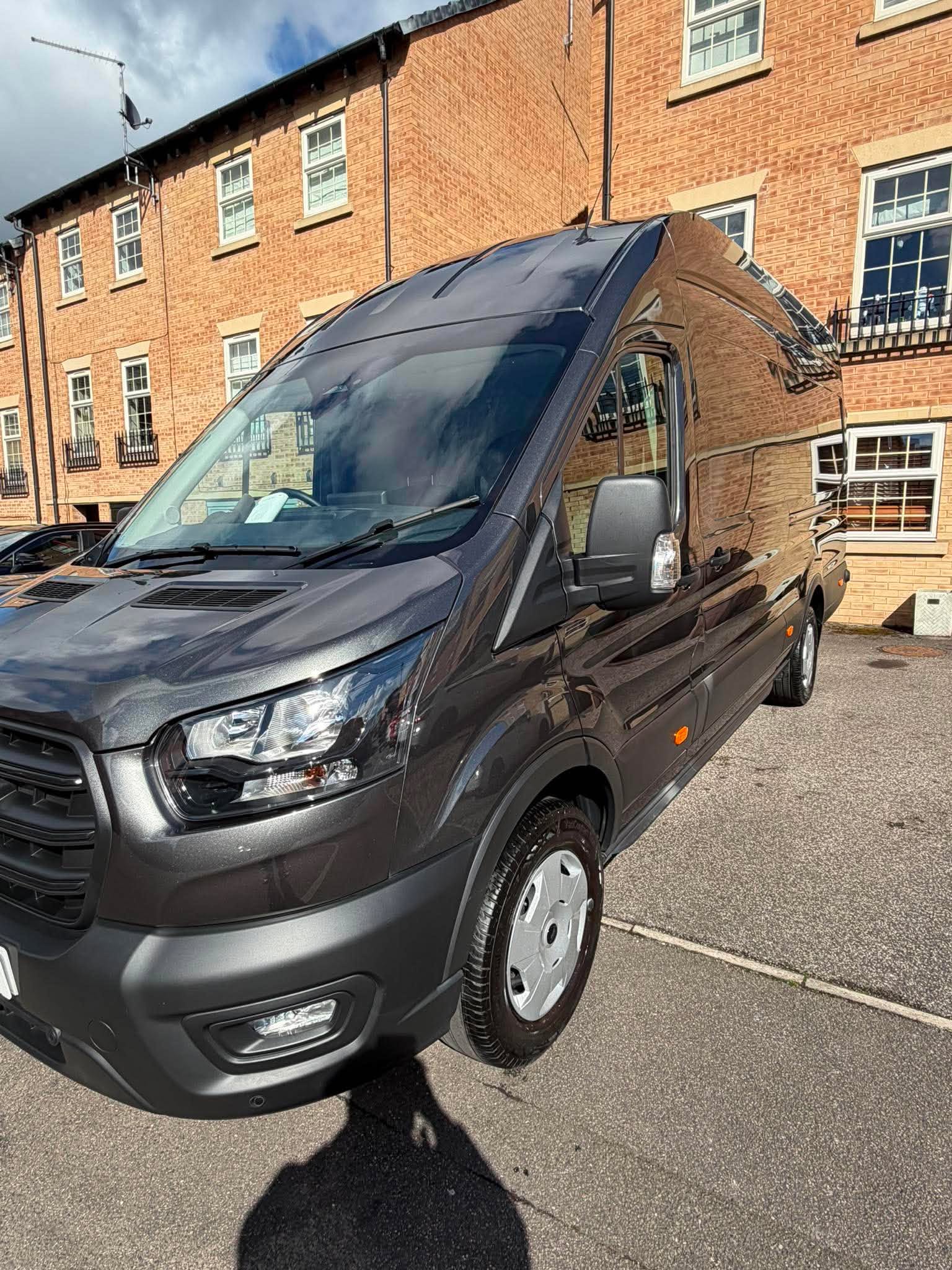 Large dark grey van after mobile exterior detailing