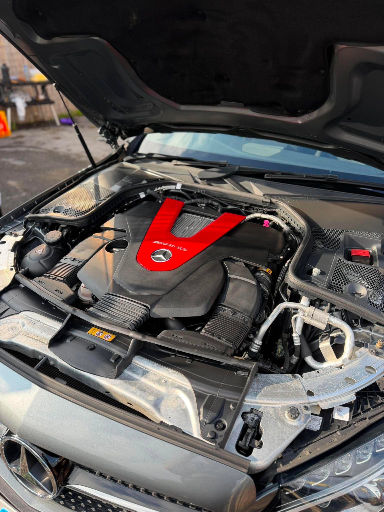 Mercedes AMG engine bay after professional detailing
